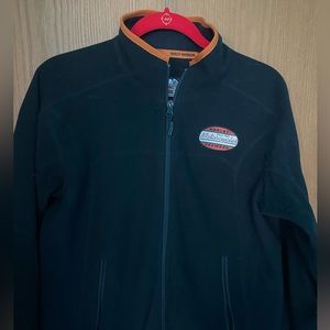 EUC .  Side zip pockets and inside pockets.  HD patch on chest .